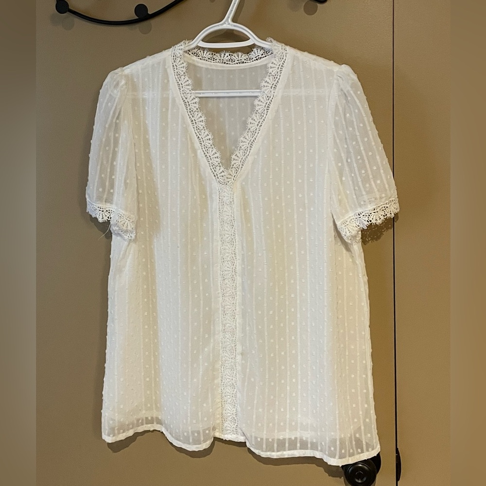 Lovely textured and lace blouse. Size M